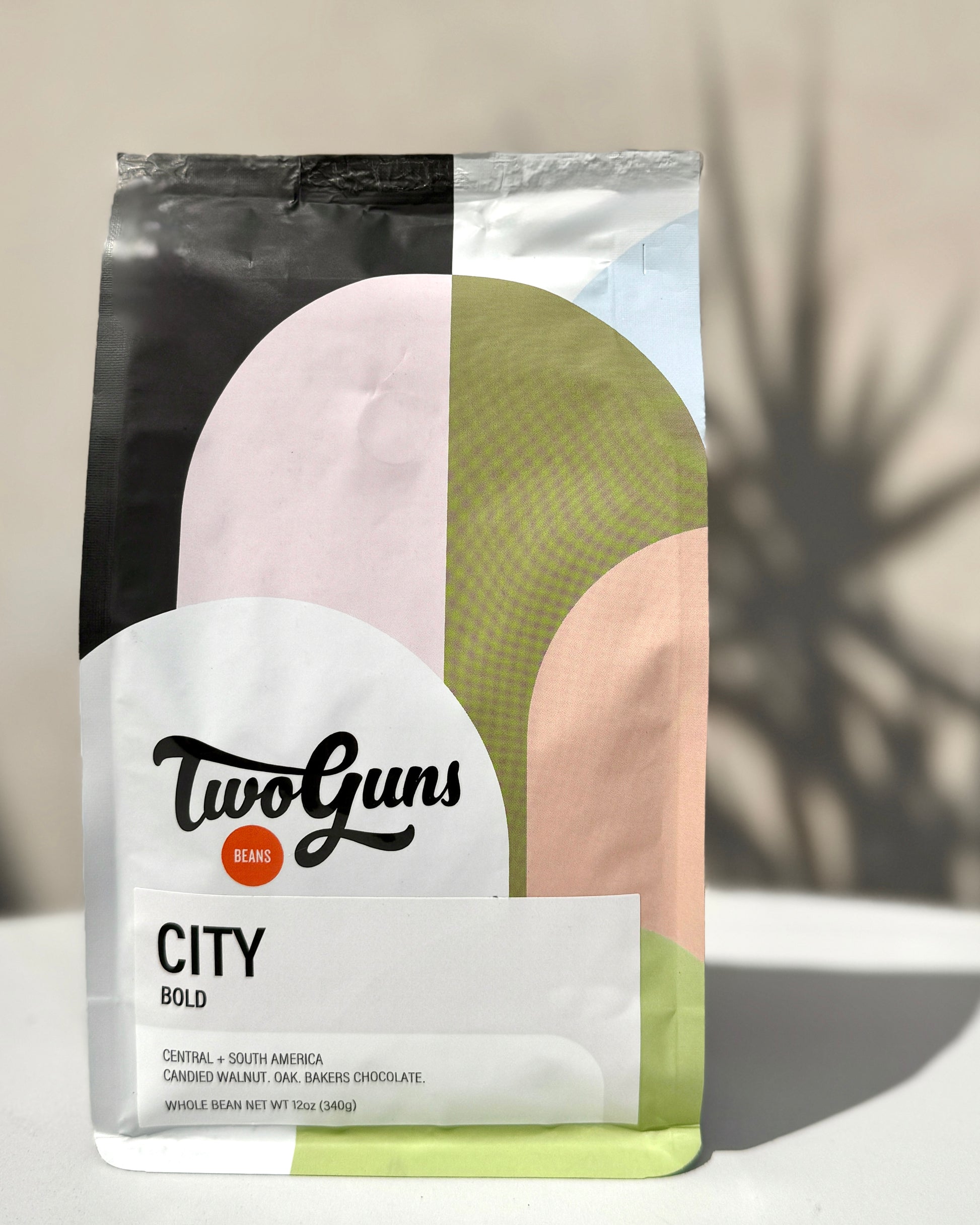 Two Guns coffee package on a neutral background